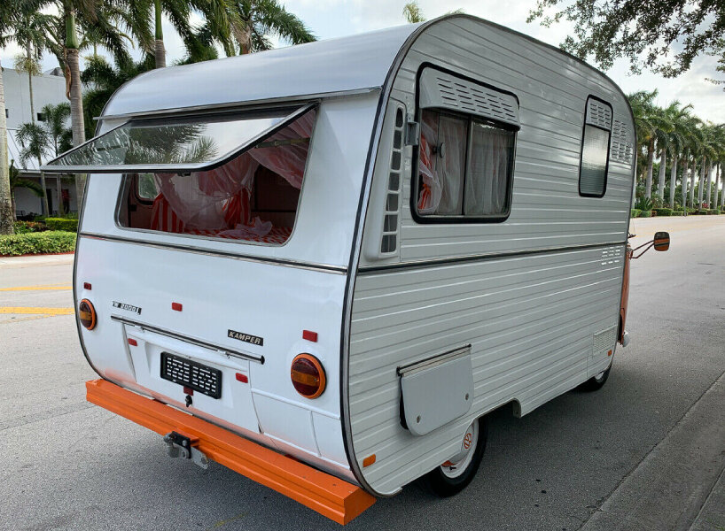 this rare 1975 volkswagen bus equipped with two-liter type 4 engine and split windows is on sale