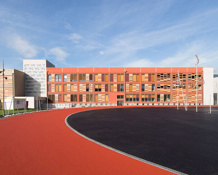 colorful brick cladding adorns school campus in france after sweeping makeover
