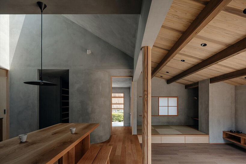 hearth architects blends concrete with timber touches within minimalistic house in japan