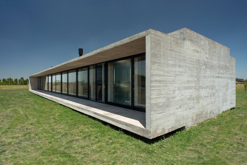 luciano kruk shapes one concrete volume for 'countryside house'