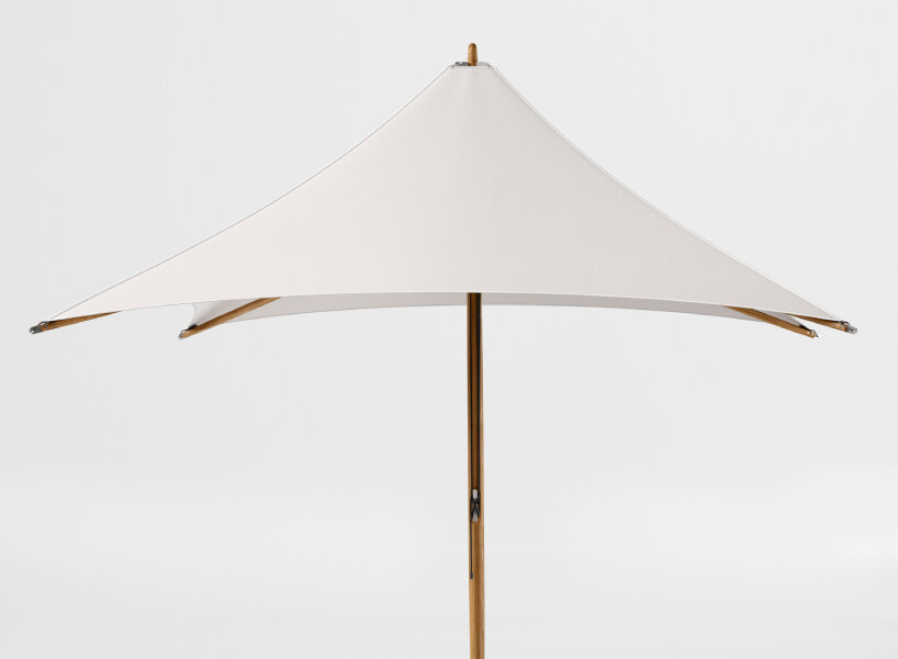 wooden parasol ‘paladin’ designed with a mini skylight on top