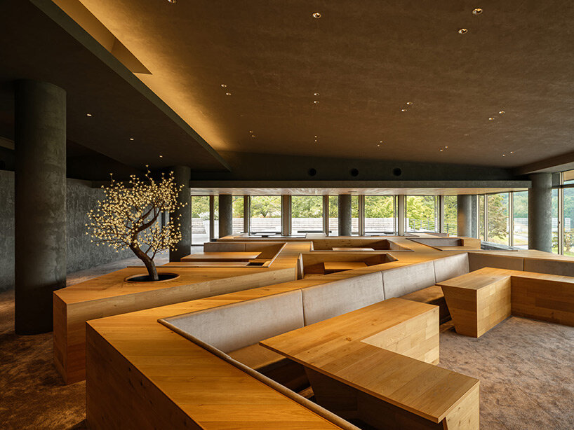 spherical saunas and indirect lighting evoke tranquility within kubo tsushima’s spa in japan