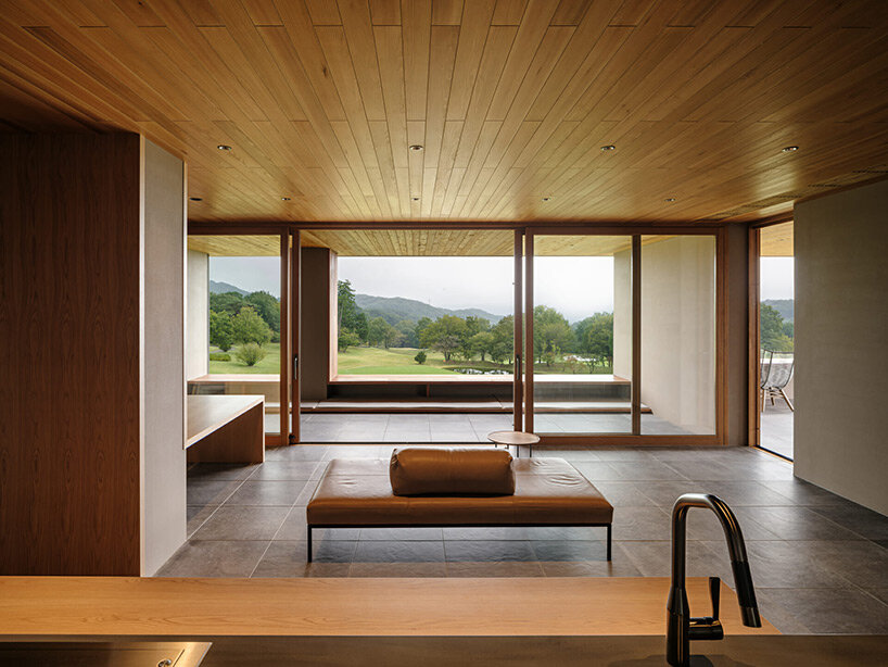spherical saunas and indirect lighting evoke tranquility within kubo tsushima’s spa in japan