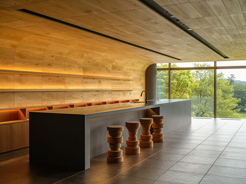 spherical saunas and indirect lighting evoke tranquility within kubo tsushima’s spa in japan