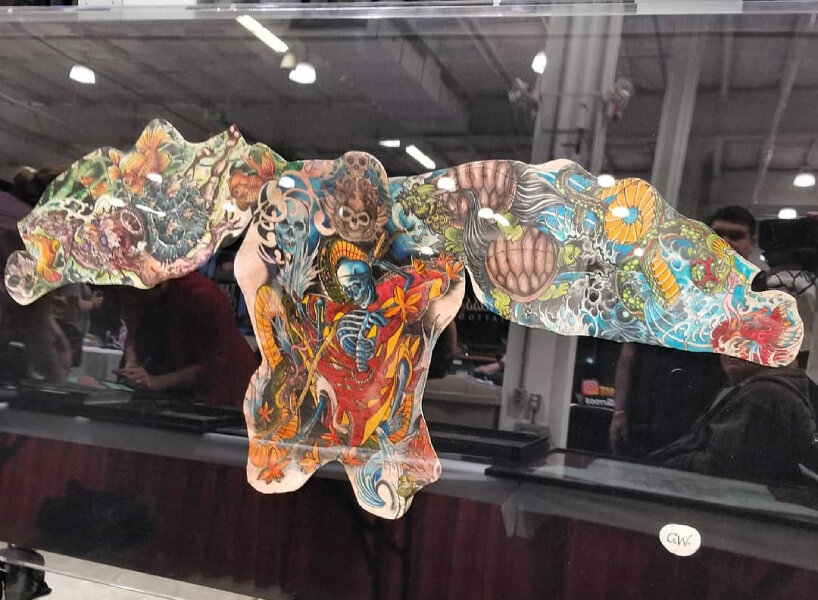 this company extracts dead people’s tattoos and preserves them into framed artworks