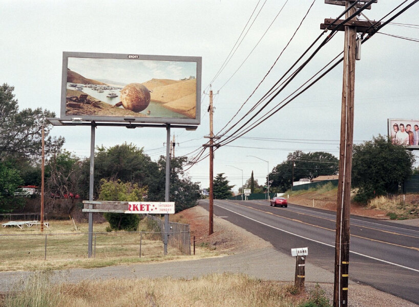 photographer puts up billboards to show drought, homelessness, and wildfires in california