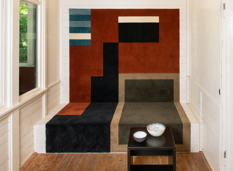 andrea zittel created five bench sculptures in soft red to gather people at esters garden house