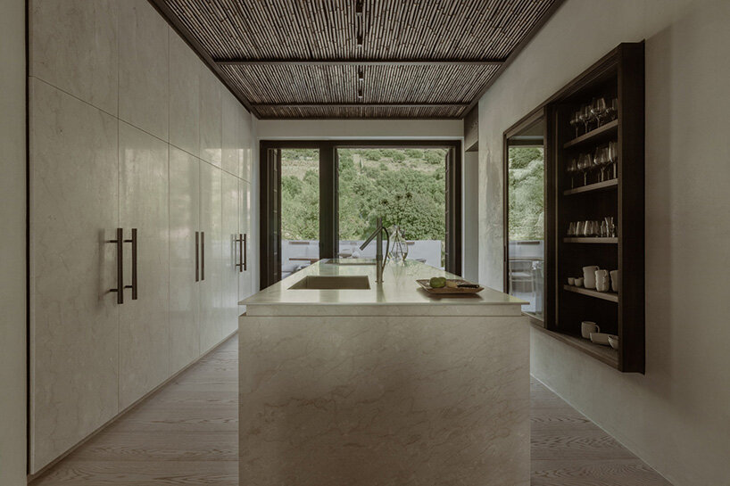 block722’s ‘hill house’ is a cluster of stone volumes among the wild landscape of crete