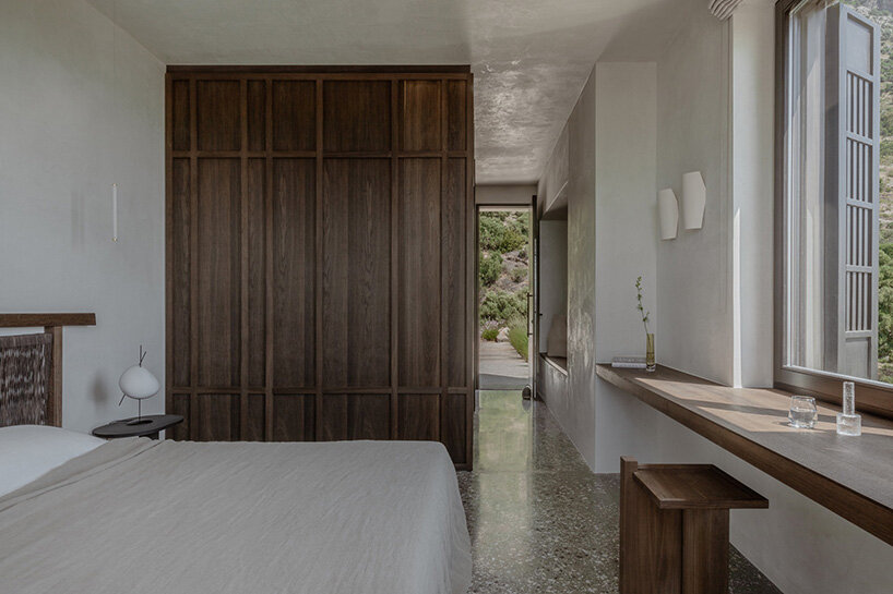 block722’s ‘hill house’ is a cluster of stone volumes among the wild landscape of crete