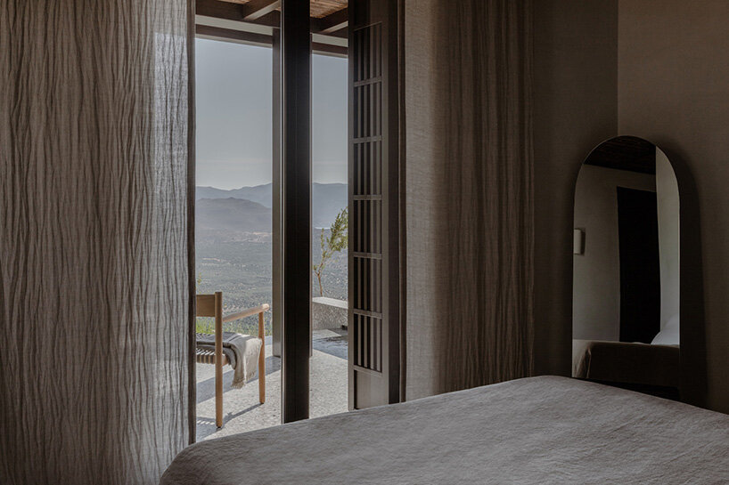 block722’s ‘hill house’ is a cluster of stone volumes among the wild landscape of crete