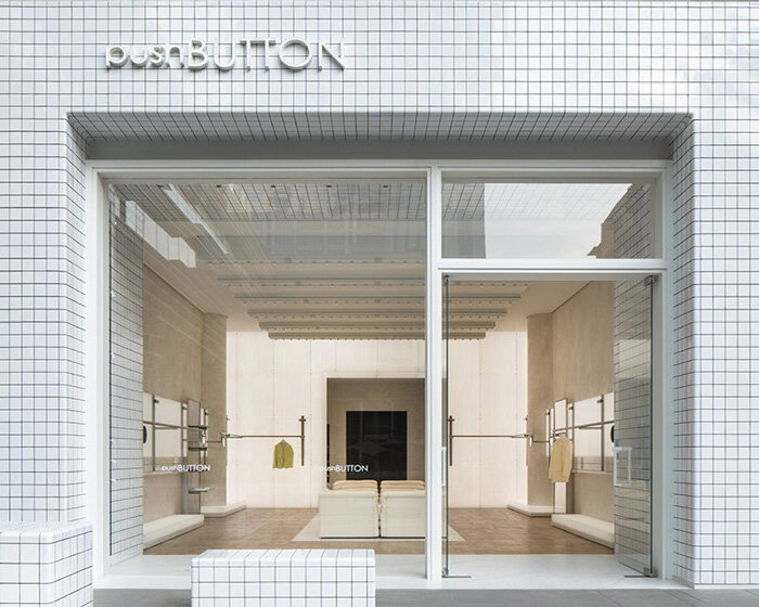 fei design clads pushBUTTON store in china with monochromatic grid facade