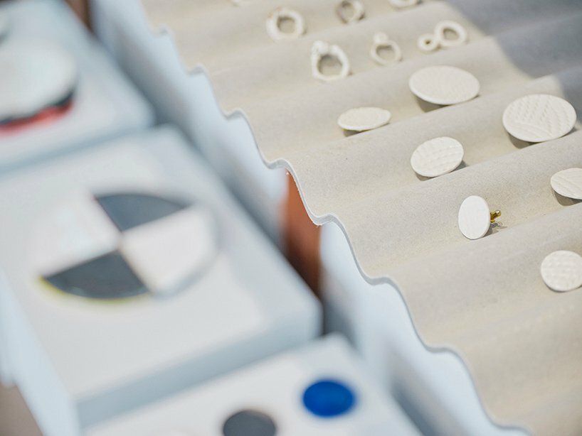 the undulating shelves are made from corrugated sheets of building material