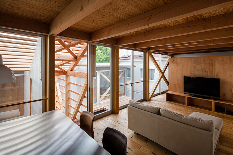 this 'house in gakuenmae' creates a peaceful garden in the urban context of nara city - 1
