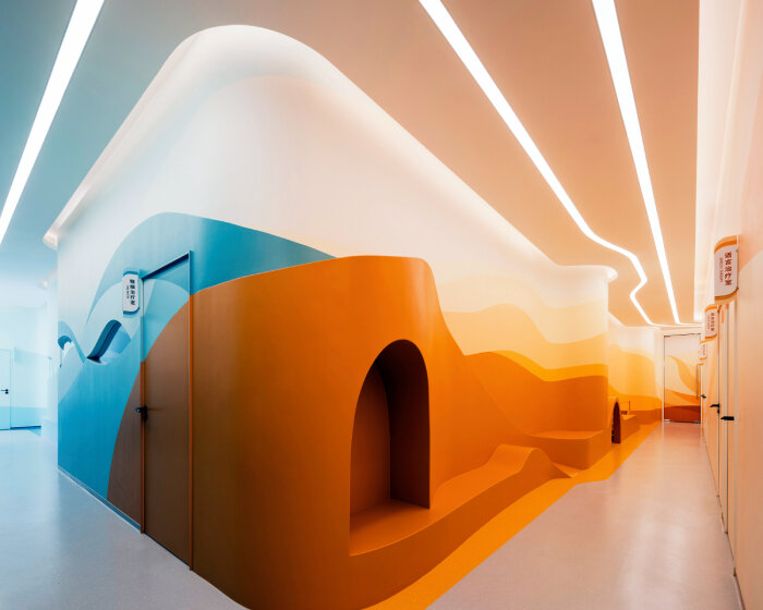 soothing colors and sweeping designs paint the pediatric medical center by UNStudio