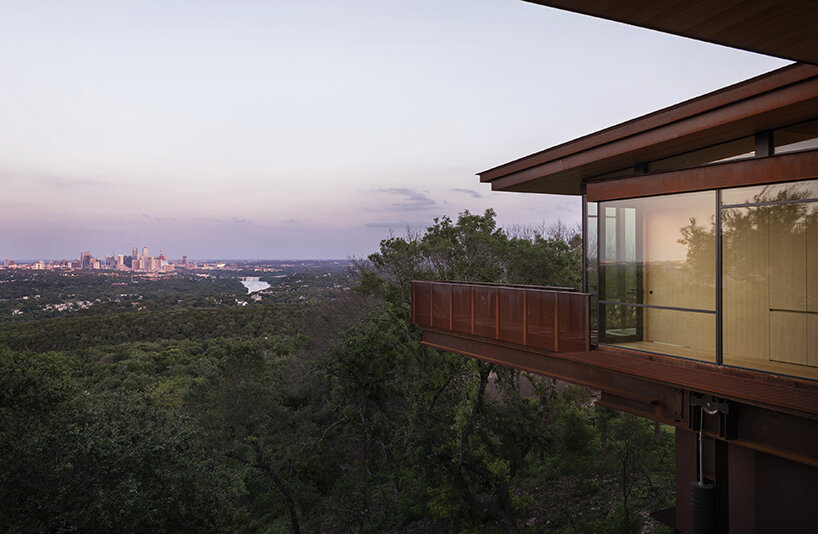 corten steel bridges reach for the austin skyline in this new olson kundig residence