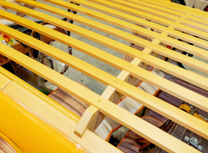 custom subaru 360 beach van oozes summer vibes with its orange hood and retro seats