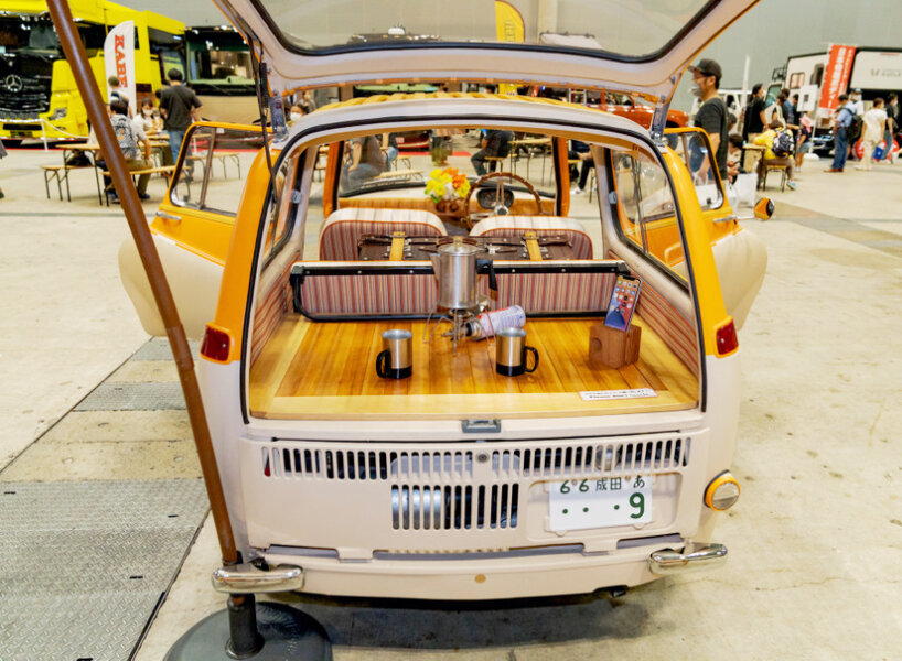 custom subaru 360 beach van oozes summer vibes with its orange hood and retro seats
