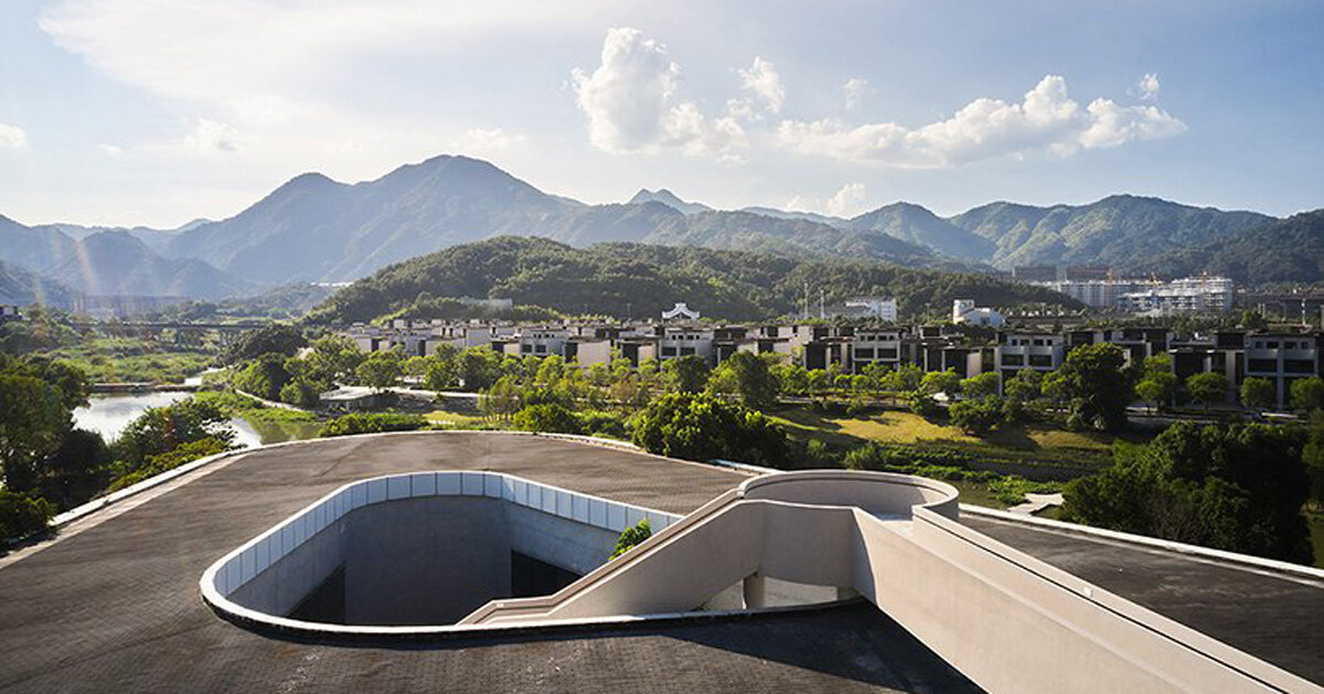 winding staircase of g-lake art gallery culminates with scenic views of ...