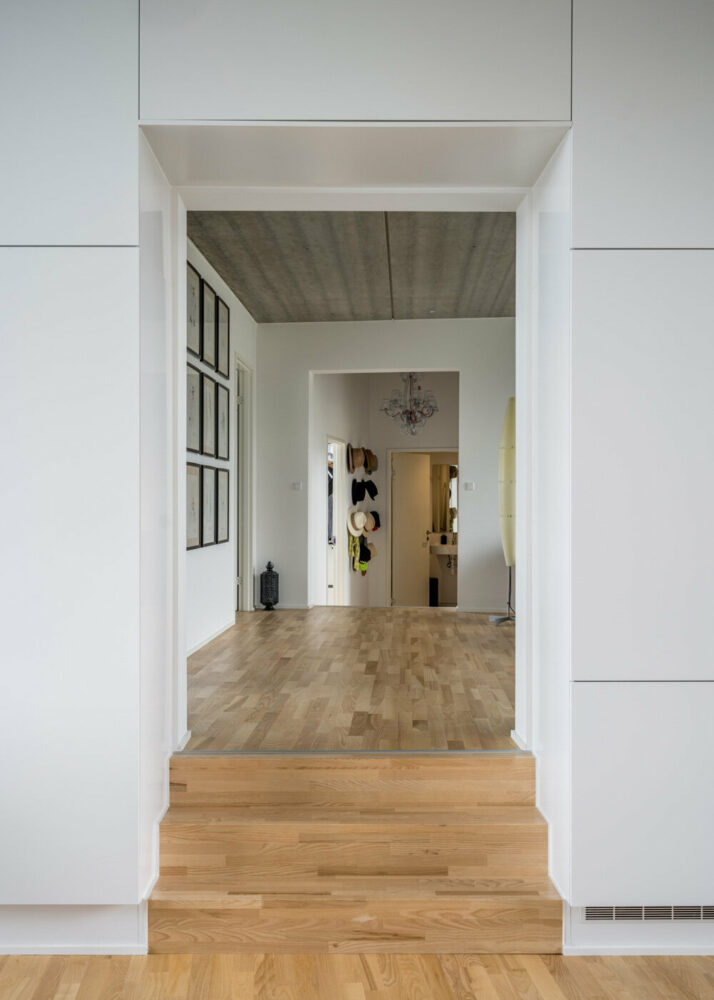 BIG’s modular housing spirals around central pond in danish sustainable suburb