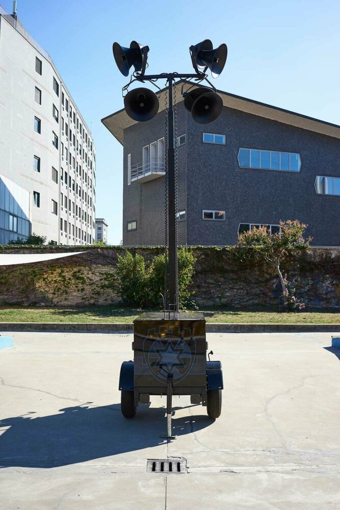 sounds and musical compositions are broadcast from the loudspeakers of Battleground Beacon