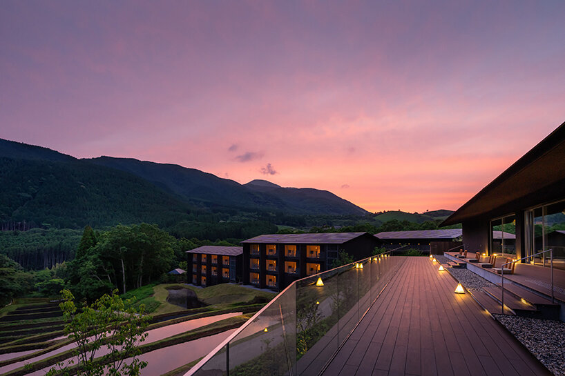 kengo kuma scatters hot spring hotel across sculpted rice terraces