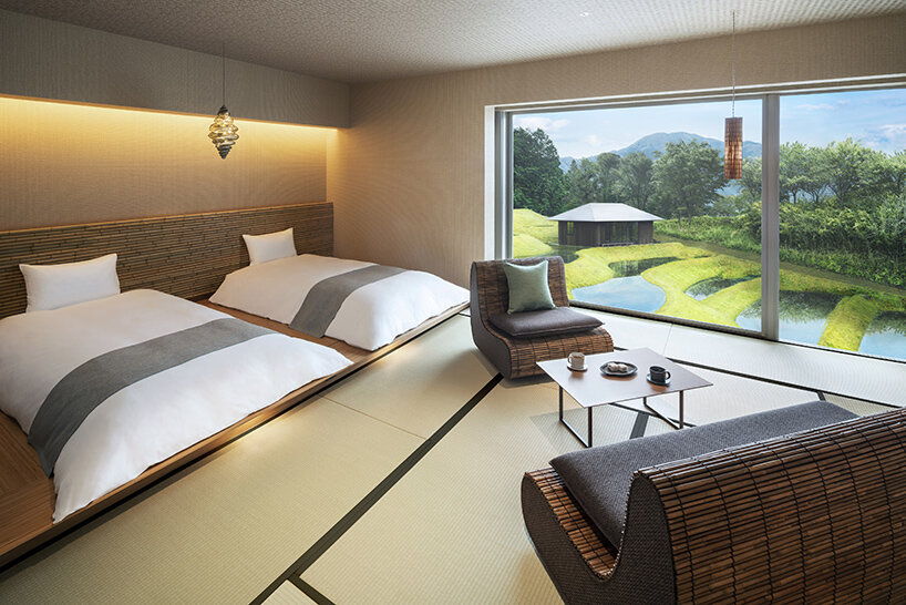 kengo kuma scatters hot spring hotel across sculpted rice terraces