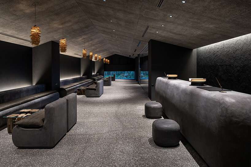 kengo kuma scatters hot spring hotel across sculpted rice terraces