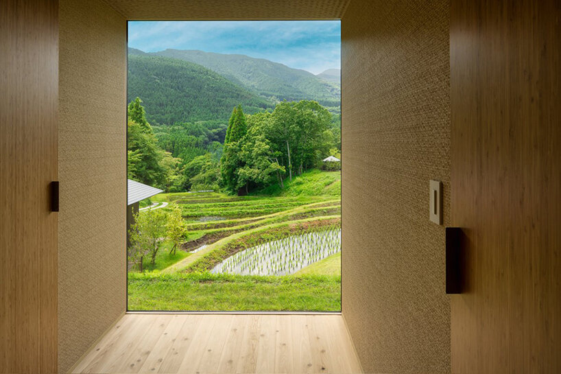 kengo kuma scatters hot spring hotel across sculpted rice terraces
