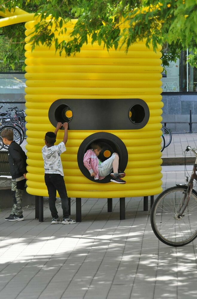moradavaga’s giant yellow characters are acoustically interconnected in square in sweden