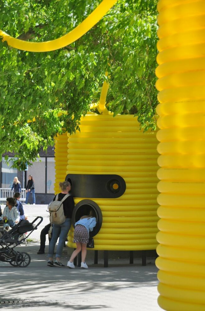 moradavaga’s giant yellow characters are acoustically interconnected in square in sweden