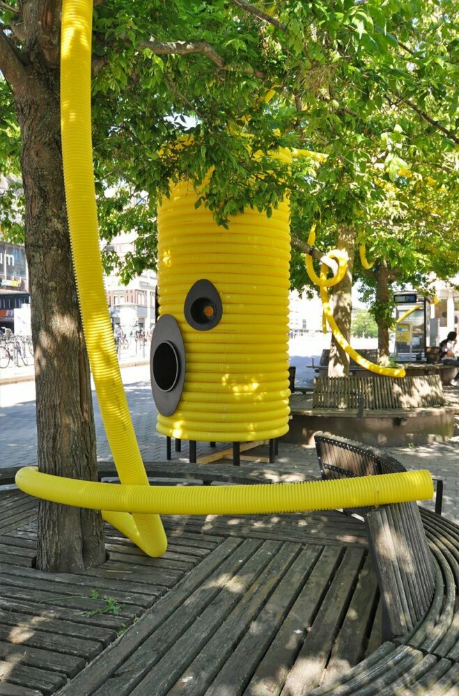 moradavaga’s giant yellow characters are acoustically interconnected in square in sweden