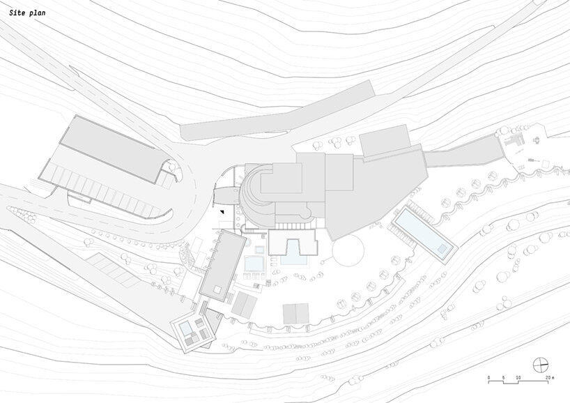 noa* defies gravity in the dolomites with its inverted ‘hub of huts’ spa