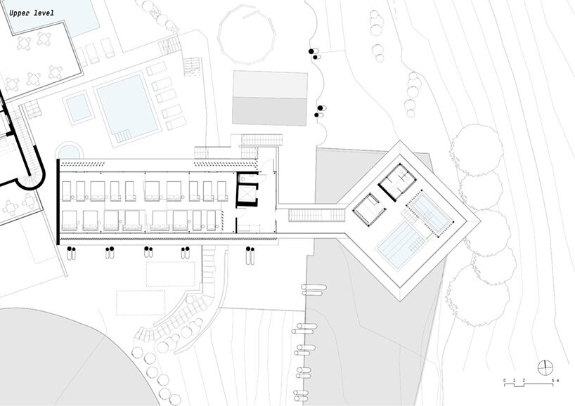 noa* defies gravity in the dolomites with its inverted ‘hub of huts’ spa