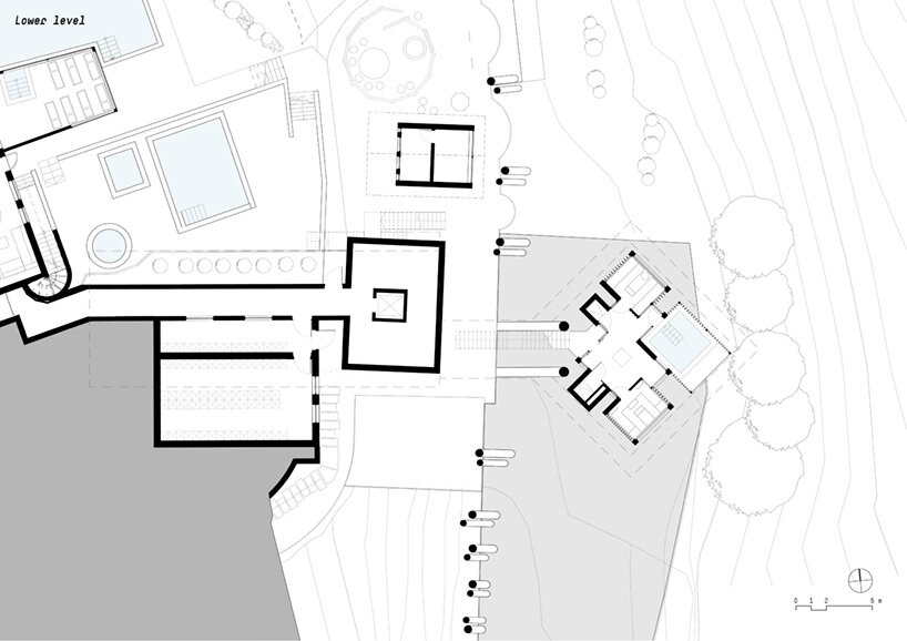 noa* defies gravity in the dolomites with its inverted ‘hub of huts’ spa