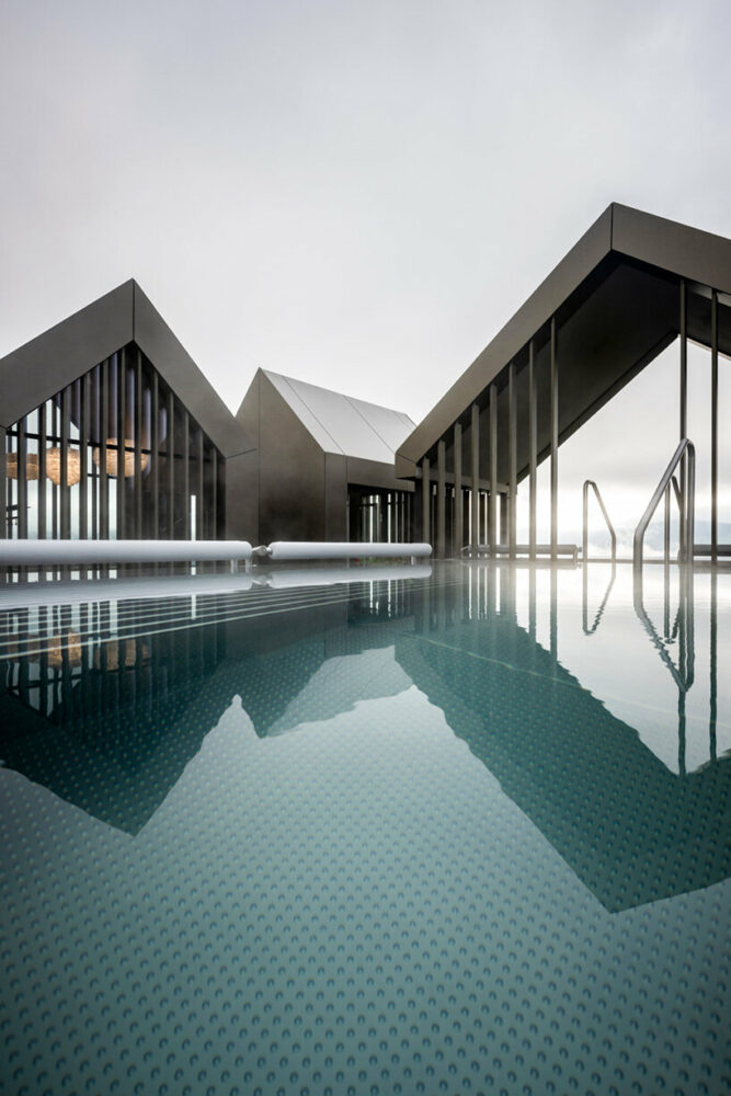 noa* defies gravity in the dolomites with its inverted ‘hub of huts’ spa