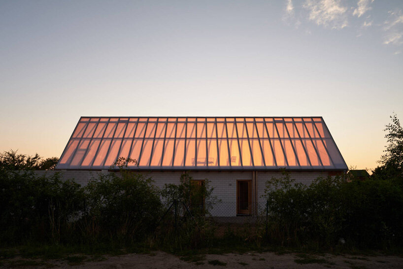 sigurd larsen tops weekend home in german countryside with clear glass gable roof