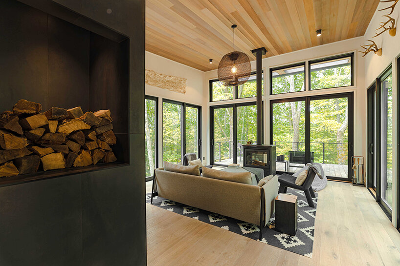 ‘cabana’ is a cantilevered, modernist retreat perched on a forest cliff in rhinebeck, NY