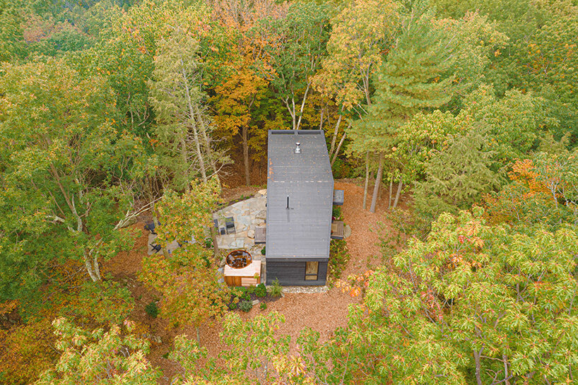 ‘cabana’ is a cantilevered, modernist retreat perched on a forest cliff in rhinebeck, NY