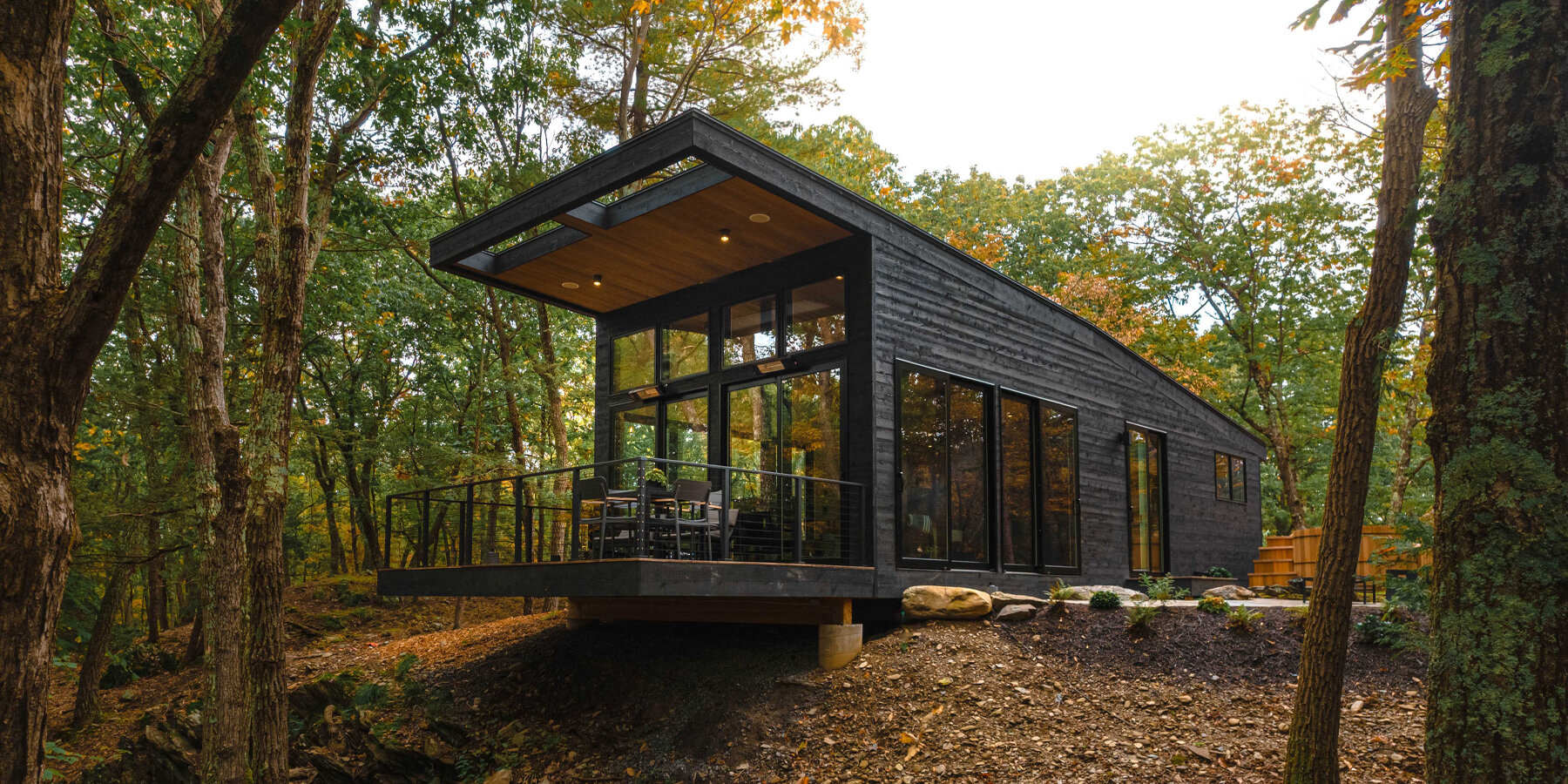 'cabana' is a cantilevered, modernist retreat perched on a forest cliff in rhinebeck, NY