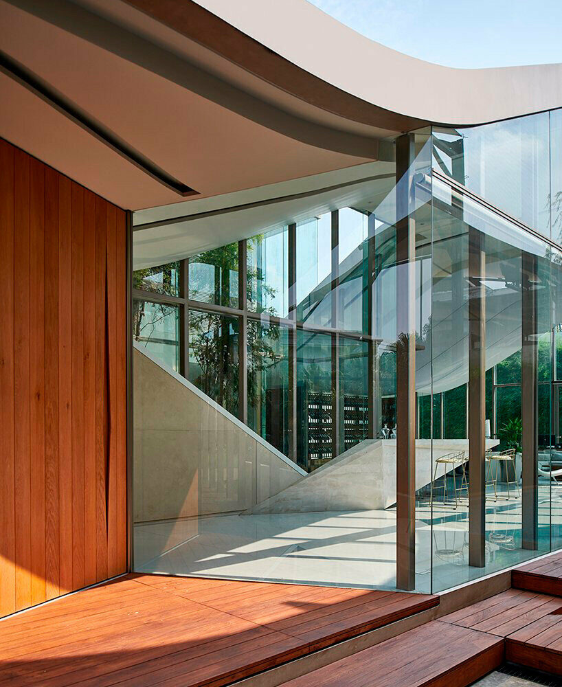 the ripple shape is supported by steel columns throughout the structure