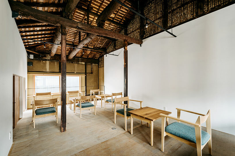 craftsman's handiwork plays with industrial touches within cozy café in kyoto city