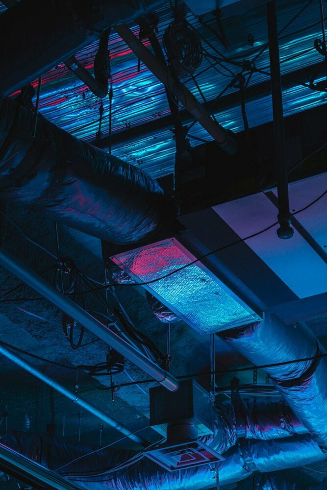 minimal lines & radiant fluorescent lighting enliven I IN’s futuristic office in tokyo