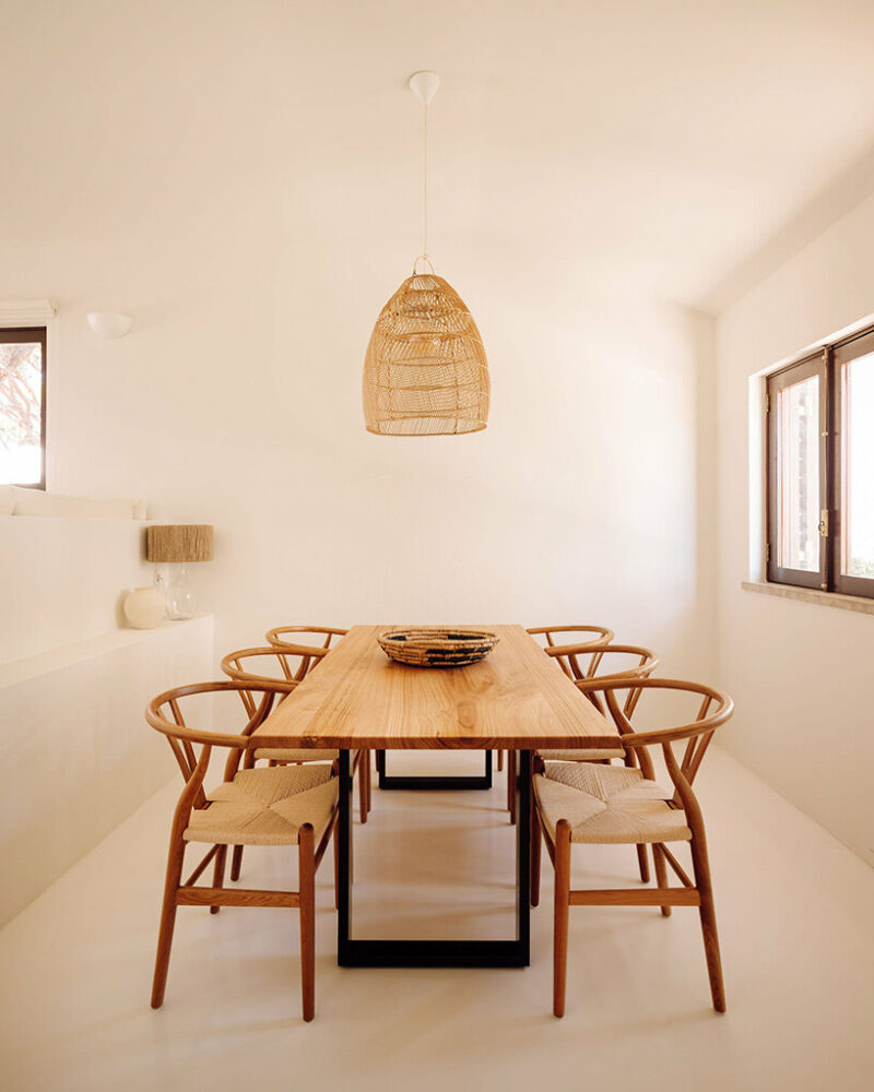 nuno nascimento balances minimalism and warmth with its ‘casa da açoteia’