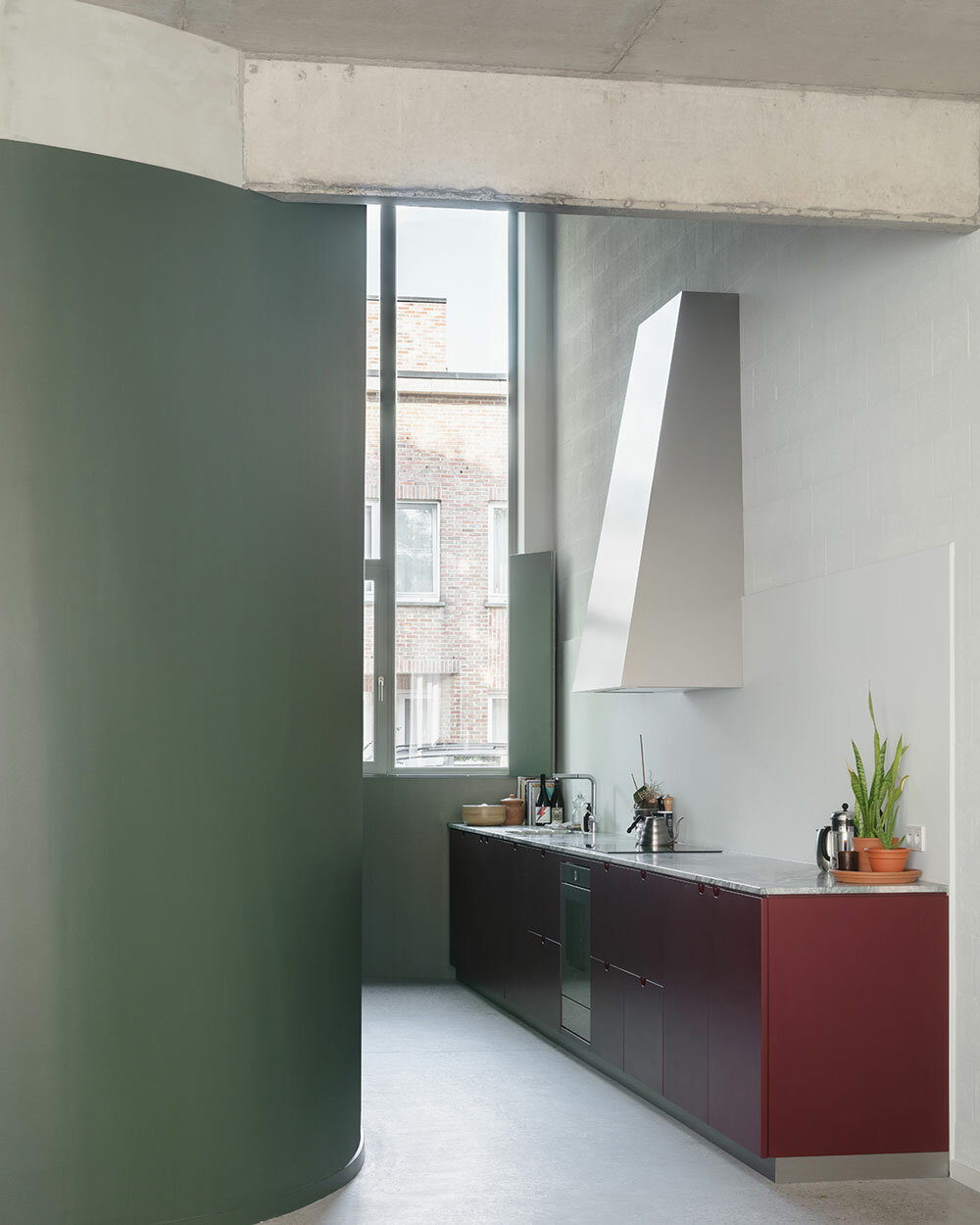 delicate lines and curves engage in visual play within minimal house in belgium - 3