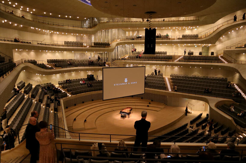designboom attends 'live' concert in elbphilharmonie capturing steinway & sons' innovative tech