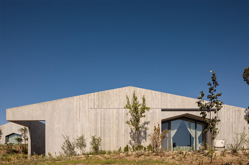 geometric cut-outs frame atlantic views for aires mateus 'pa.te.os' in portugal