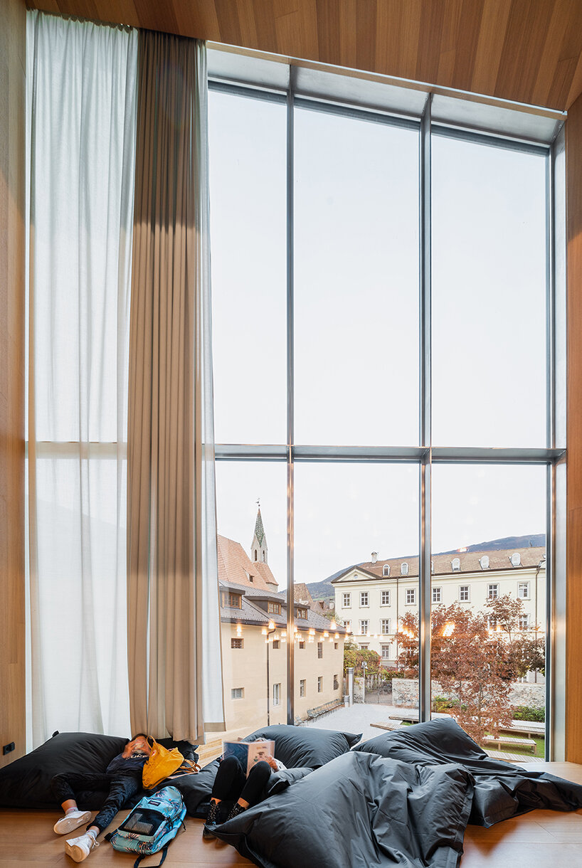 carlana mezzalira pentimalli’s new brixen public library in italy pairs history with modernity - 2