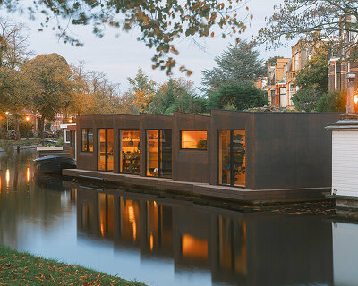 studio RAP designs a sustainable floating home from timber and solid cork