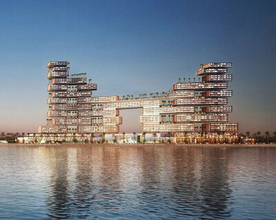 with extravagant bridging towers, dubai's newest ultra-luxury resort completes
