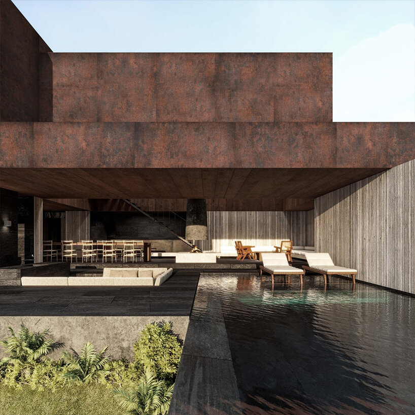 'not a hotel' unveils corten steel house by suppose design office perched on a hillside